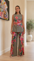 Indoor front view of black striped floral two-piece wide-leg pant set