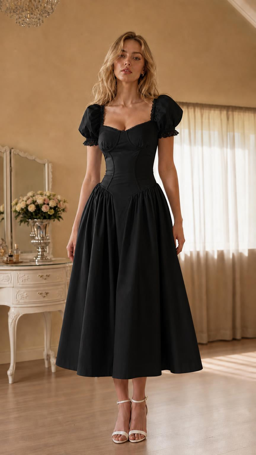 Front view of woman wearing black vintage corset midi dress