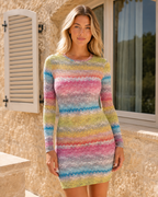 Close-up front view of women's multicolor striped long sleeve knit mini dress