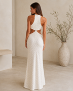 Back view of white textured halter cutout maxi dress