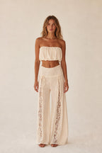 Full overview of the white two-piece ensemble