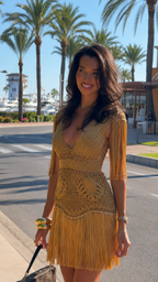 Mustard crochet fringe mini dress close front view with deep V neckline