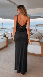 Black satin-look maxi slip dress shown from the back with lace back detail